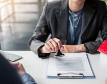 Person signing mortgage documents